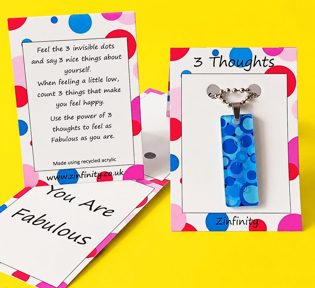 3 Dot Pendant with packaging front and back