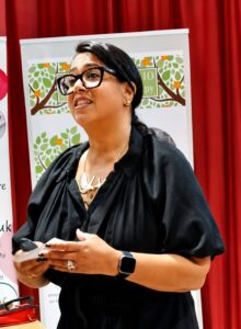 Woman speaking at Wish I'd Known Connect event, 10 steps to therapy